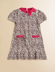 Here's the spot for a wild and fun animal print in a soft, sweater-y knit with bright contrast trim.Contrast ribbed crew neckline with bowShort sleeves with elasticized cuffsKeyhole button back closeFront patch pockets with contrast bow trimA-line shapeRuffled hemRamie/cottonMachine washImported Here's the spot for a wild and fun animal print in a soft, sweater-y knit with bright contrast trim.Contrast ribbed crew neckline with bowShort sleeves with elasticized cuffsKeyhole button back closeFront patch pockets with contrast bow trimA-line shapeRuffled hemRamie/cottonMachine washImported