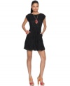 A cutout bow-tie back lightens up this all-lace Bar III A-line dress for a darkly romantic spring look!