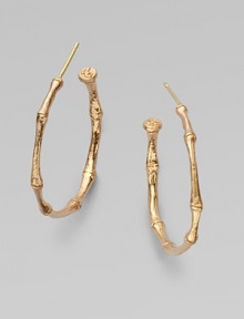A bamboo hoop in 18K gold for a subtle twist to classic design.18K gold Diameter, about 1 Post backs Made in USA A bamboo hoop in 18K gold for a subtle twist to classic design.18K gold Diameter, about 1 Post backs Made in USA