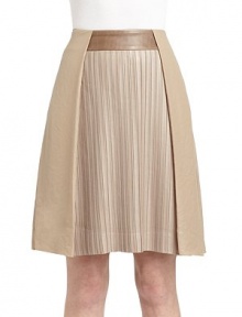 THE LOOKBanded leather waistband, frontAccordion pleated front with draped overlay at sides Back zip with hook-and-eye closureTHE FITAbout 21 from waist to hemTHE MATERIALBody: polyesterTrim: lambskin leatherCARE & ORIGINDry cleanMade in USAModel shown is 5'9 (175cm) wearing US size 4. THE LOOKBanded leather waistband, frontAccordion pleated front with draped overlay at sides Back zip with hook-and-eye closureTHE FITAbout 21 from waist to hemTHE MATERIALBody: polyesterTrim: lambskin leatherCARE & ORIGINDry cleanMade in USAModel shown is 5'9 (175cm) wearing US size 4.