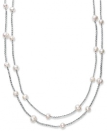 True treasures of the deep. Cultured freshwater pearls (8-10 mm) make a strong statement upon intricately woven silver tone polyester thread. Necklace is long enough to wrap twice for added volume. Approximate length: 64 inches. True treasures of the deep. Cultured freshwater pearls (8-10 mm) make a strong statement upon intricately woven silver tone polyester thread. Necklace is long enough to wrap twice for added volume. Approximate length: 64 inches.