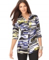 In a bold print, this Alfani blouse adds a pop of color to your winter wardrobe!