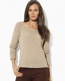 A breezy sweater is rendered in an open knit from lightweight linen and cotton yarns to create a chic layering option.