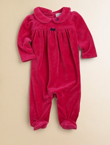 A beautiful long-sleeved footed coverall in plush velour is highlighted with pretty puff sleeves and embroidery.Peter Pan collarLong sleevesBack buttonsGathered empire waistConcealed bottom snaps80% cotton/20% polyesterMachine washImported Please note: Number of snaps/buttons may vary depending on size ordered. 