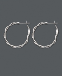 A simple twist takes your look a long way. Traditional hoop earrings feature a twisted design in sterling silver. Approximate diameter: 7/8 inch. A simple twist takes your look a long way. Traditional hoop earrings feature a twisted design in sterling silver. Approximate diameter: 7/8 inch.
