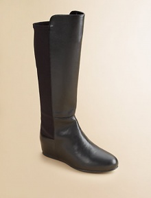She'll be styling like a cowgirl in these faux leather, ultra-versatile, ultra-tall boots.Pull-on styleFaux leather and neoprene upperFaux leather liningRubber solePadded insoleImported She'll be styling like a cowgirl in these faux leather, ultra-versatile, ultra-tall boots.Pull-on styleFaux leather and neoprene upperFaux leather liningRubber solePadded insoleImported