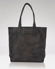 With a laser-cut skull motif, Frye's oversized leather tote adds an edge. Channel your inner biker chic and pair this carryall with hard-hitting moto boots and the sharpest of leather jackets. With a laser-cut skull motif, Frye's oversized leather tote adds an edge. Channel your inner biker chic and pair this carryall with hard-hitting moto boots and the sharpest of leather jackets.