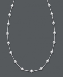 A simple layer that adds polish and shine. Giani Bernini's station necklace features shiny beads strung from a delicate chain. Crafted in sterling silver. Approximate length: 16 inches + 3-inch extender. A simple layer that adds polish and shine. Giani Bernini's station necklace features shiny beads strung from a delicate chain. Crafted in sterling silver. Approximate length: 16 inches + 3-inch extender.
