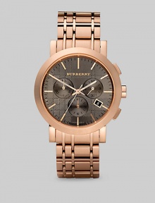 A standard-bearer of gentlemanly style, designed with a taupe dial and three-eye chronograph functionality on a check-inspired link bracelet. Round bezel Quartz movement Three-eye chronograph functionality Water resistant to 5 ATM Date function at 4 o'clock Second hand Stainless steel case: 40mm (1.57) Link bracelet: 20mm (0.79) Deployment clasp Made in Switzerland A standard-bearer of gentlemanly style, designed with a taupe dial and three-eye chronograph functionality on a check-inspired link bracelet. Round bezel Quartz movement Three-eye chronograph functionality Water resistant to 5 ATM Date function at 4 o'clock Second hand Stainless steel case: 40mm (1.57) Link bracelet: 20mm (0.79) Deployment clasp Made in Switzerland