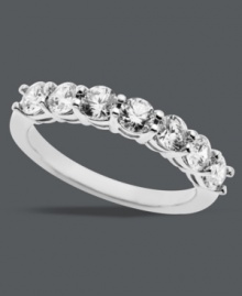 A sparkling statement maker. Arabella's stunning 7-stone ring features round-cut Swarovski zirconias (2-1/6 ct. t.w.) set in sterling silver. Size 7.