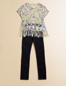 An airy, poncho-style, crocheted design with fringed hem in a vivid palette.ScoopneckShort sleevesPullover styleFringed hem50% rayon/50% cottonHand washImported An airy, poncho-style, crocheted design with fringed hem in a vivid palette.ScoopneckShort sleevesPullover styleFringed hem50% rayon/50% cottonHand washImported