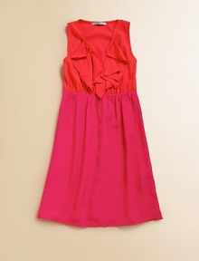 A classic A-line frock is given an update in a colorblock design with ruffled v-neck for a pretty, girlie touch.Ruffled v-neckSleevelessPullover styleElastic waistbandPolyesterHand washMade in the USA of imported