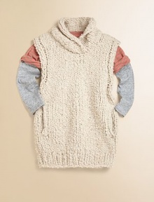 Loopy Italian knit adds a light layer of comfort, warmth and style.Sleeveless pullover Shawl collar Vertical front pockets Side zippers at hem 84% wool/13% camel hair/3% cashmere Dry clean Imported Loopy Italian knit adds a light layer of comfort, warmth and style.Sleeveless pullover Shawl collar Vertical front pockets Side zippers at hem 84% wool/13% camel hair/3% cashmere Dry clean Imported