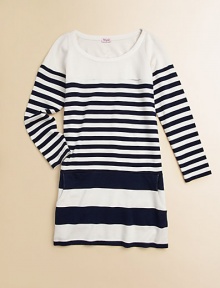 Stripes go from none at the top to thin through the body to wide at the hem in this effortless smooth knit tunic that can double as a dress.Scoop necklineLong sleevesPullover stylingModal/cottonMachine washImported Stripes go from none at the top to thin through the body to wide at the hem in this effortless smooth knit tunic that can double as a dress.Scoop necklineLong sleevesPullover stylingModal/cottonMachine washImported