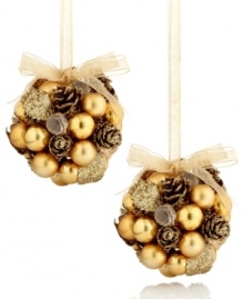 Nature-inspired beauty sits upon your tree with these beautifully crafted Kissing Ball ornaments. Golden spheres blend with rustic pinecones all coated with gold sparkles for a luxe effect. Nature-inspired beauty sits upon your tree with these beautifully crafted Kissing Ball ornaments. Golden spheres blend with rustic pinecones all coated with gold sparkles for a luxe effect.