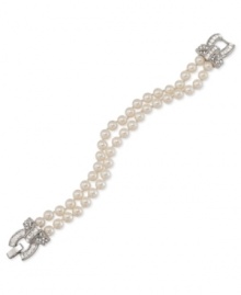 A glamorous touch, twice over. This double-row bracelet from Carolee is crafted from silver-tone mixed metal with glass pearls adding a look that's both timeless and elegant. Approximate length: 7-1/2 inches.