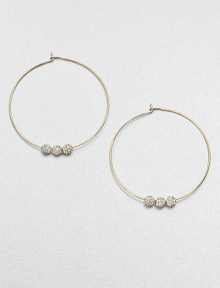 From the Brilliance Collection. A slender wire hoop, adorned with three sparkling beads, creates a look of understated glamour.GlassGoldtoneDiameter, about 1.25PiercedImported From the Brilliance Collection. A slender wire hoop, adorned with three sparkling beads, creates a look of understated glamour.GlassGoldtoneDiameter, about 1.25PiercedImported