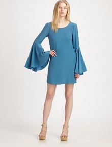 A vintage-inspired design of liquid-smooth silk, featuring dramatic bell sleeves for amplified style. JewelneckDropped shouldersLong bell sleeves with side slitsBack keyhole with single button closureAbout 33½ from shoulder to hemSilkDry cleanImportedModel shown is 5'10 (177cm) wearing US size Small.