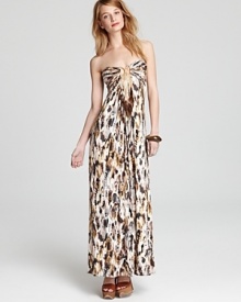 An exotic feather print lends whimsy to this sunny-season Sky strapless maxi dress, punctuated by ethereal feather-adorned chains at the bust.