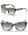 Get spotted in these slight cat eye frames with gradient lenses from Roberto Cavalli.