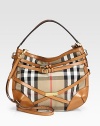 Rich leather wraps around pure cotton, adding sophisticated style to the classic Burberry check. Leather top handle, 4½ dropAdjustable, detachable leather shoulder strap, 22-24½ dropTop zip closureOne inside zip pocketTwo inside open pocketsCotton lining15W X 12H X 6DMade in Italy