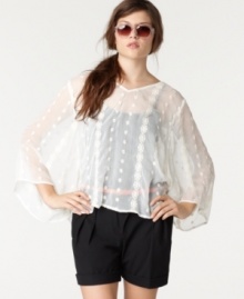 The poncho gets updated for spring in a sheer, lightweight fabric with delicate embroidery, from Bar III.