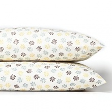 Dappled with a modern floral print in muted hues, these Sky standard pillowcases refresh your bedding with contemporary coziness. Dappled with a modern floral print in muted hues, these Sky standard pillowcases refresh your bedding with contemporary coziness.
