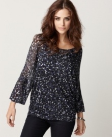 A dainty print takes this tee from plain to pretty! Loose and comfy, it's sure to become a go-to top.