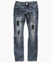 Grunge meets glam in these distressed Guess jeans styled with tears, sequins and attitude. Grunge meets glam in these distressed Guess jeans styled with tears, sequins and attitude.