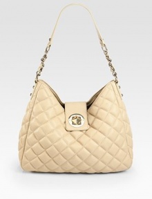 A quilted style in luxurious pebbled leather with a chic turnlock closure.Chain and leather shoulder strap, 11 dropTurnlock strap closureOne inside zip pocketTwo inside open pocketsJacquard lining14W X 11½H X 5DImported A quilted style in luxurious pebbled leather with a chic turnlock closure.Chain and leather shoulder strap, 11 dropTurnlock strap closureOne inside zip pocketTwo inside open pocketsJacquard lining14W X 11½H X 5DImported