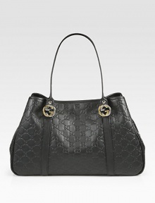 Classic silhouette of Guccissima leather with iconic GG logo accents. Double shoulder straps, 7 dropMagnetic snap closureProtective metal feetOne inside zip pocketTwo inside open pocketsFully lined15W X 9¼H X 4DMade in Italy Classic silhouette of Guccissima leather with iconic GG logo accents. Double shoulder straps, 7 dropMagnetic snap closureProtective metal feetOne inside zip pocketTwo inside open pocketsFully lined15W X 9¼H X 4DMade in Italy