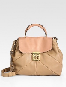 Store your necessities in this roomy leather silhouette finished with a signature retro turn-clasp.Top handle, 2½ drop Adjustable shoulder strap, 15½ drop Flap and turnlock closure One inside zip pocket Cotton lining 12½W X 10H X 4½D Imported Store your necessities in this roomy leather silhouette finished with a signature retro turn-clasp.Top handle, 2½ drop Adjustable shoulder strap, 15½ drop Flap and turnlock closure One inside zip pocket Cotton lining 12½W X 10H X 4½D Imported