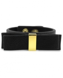 BCBGeneration makes a subtle, but bold statement with this snap bracelet. With details crafted from gold-tone mixed metal, the bracelet features a bow on top for a fashionable touch. Approximate length: 8 inches. BCBGeneration makes a subtle, but bold statement with this snap bracelet. With details crafted from gold-tone mixed metal, the bracelet features a bow on top for a fashionable touch. Approximate length: 8 inches.