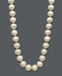 The perfect gift of timeless beauty. This versatile strand of cultured freshwater pearls (11-12 mm) comes in a 14k gold setting. Approximate length: 18 inches. The perfect gift of timeless beauty. This versatile strand of cultured freshwater pearls (11-12 mm) comes in a 14k gold setting. Approximate length: 18 inches.