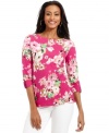 Feminine florals bloom on Charter Club's crisp top. It looks thoroughly modern with skinny jeans in winter white.