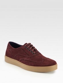 Classic wingtip styling and composition finished in supremely soft suede, shapes and defines this lace-up design with a contrasting rubber sole that exudes a downtown-cool look.Suede upperLeather liningPadded insoleRubber soleImported