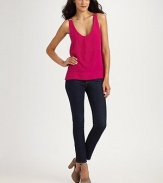 Supple matte silk skims the body in elongated scoopneck tank, embellished with goldtone accents at the shouldersWide strapsScoopneckSlightly longer hem in backAbout 25 from shoulder to hemSilkDry cleanImported