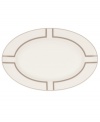 Metallic bronze lines create the sleek geometric pattern framing this glossy butter/relish tray from Noritake serveware. Crafted in durable bone china and trimmed with platinum for fine dining or everyday use.