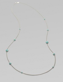 From the Silver Wonderland Collection. A long, lovely sterling silver chain is brightly dotted with faceted turquoise in an array of sizes. Turquoise Sterling silver Length, about 38 Lobster clasp Imported From the Silver Wonderland Collection. A long, lovely sterling silver chain is brightly dotted with faceted turquoise in an array of sizes. Turquoise Sterling silver Length, about 38 Lobster clasp Imported