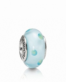 A whimsical murano glass charm with a playful polka dot pattern. Logo-engraved sterling silver trim expresses the PANDORA signature.