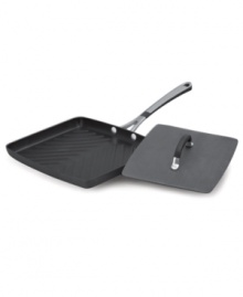 Simply Calphalon knows how to handle pressing matters. This panini pan features a durable nonstick surface to ensure a perfectly pressed sandwich, while the heavy press helps increase your food's contact with the cooking surface to guarantee a fast, even sear. 10-year warranty. Simply Calphalon knows how to handle pressing matters. This panini pan features a durable nonstick surface to ensure a perfectly pressed sandwich, while the heavy press helps increase your food's contact with the cooking surface to guarantee a fast, even sear. 10-year warranty.