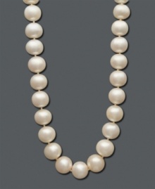 Nothing exudes elegance more than a classic pearl necklace. With a 14k gold clasp, Belle de Mer's sophisticated strand features cultured freshwater pearls (12-13 mm). Approximate length: 18 inches. Nothing exudes elegance more than a classic pearl necklace. With a 14k gold clasp, Belle de Mer's sophisticated strand features cultured freshwater pearls (12-13 mm). Approximate length: 18 inches.