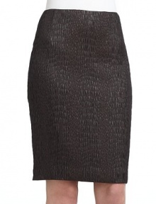 THE LOOKAllover textured constructionVented back hemBack zip with hook-and-eye-closureTHE FITAbout 22 from waist to hemTHE MATERIAL89% polyester/10% nylon/1% elastaneFully linedCARE & ORIGINDry cleanImportedModel shown is 5'10 (177cm) wearing US size 4. THE LOOKAllover textured constructionVented back hemBack zip with hook-and-eye-closureTHE FITAbout 22 from waist to hemTHE MATERIAL89% polyester/10% nylon/1% elastaneFully linedCARE & ORIGINDry cleanImportedModel shown is 5'10 (177cm) wearing US size 4.
