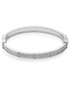 Shimmering and stylish. Fossil's bangle bracelet is crafted from silver-tone stainless steel with sparkling accents providing a lustrous touch. Approximate diameter: 2-5/8 inches.