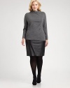 Soft Italian wool adds a luxurious feel to this intriguing turtleneck. Its well-placed front seam will complement your midsection.Unique turtleneckLong sleevesDropped shouldersPull-on styleAbout 28 from shoulder to hemWoolHand washImported of Italian fabric