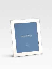 A slightly wider border lends added visual impact to a tarnish-proof silverplated frame with a rich velvet back. Accommodates a 4 X 6 photograph Overall: 6 X 8 Imported A slightly wider border lends added visual impact to a tarnish-proof silverplated frame with a rich velvet back. Accommodates a 4 X 6 photograph Overall: 6 X 8 Imported