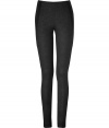 An exquisitely modern choice for business to cocktails looks, Donna Karans coated stretch skinny pants cut a flattering figure no matter how you wear them - Black contoured seaming, elasticized waistline, pulls on - Form-fitting - Team with feminine tops, chunky knits, and standout statement accessories