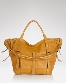 Isabella Fiore gives the slouchy hobo a bohemian luxe update in lived-in leather with distinctive detailing. It's our favorite way to carry free spirited style. Isabella Fiore gives the slouchy hobo a bohemian luxe update in lived-in leather with distinctive detailing. It's our favorite way to carry free spirited style.