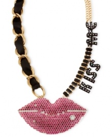 Seal it with a kiss. Betsey Johnson's Kiss Me necklace, crafted from gold-tone mixed metal, features black and fuchsia glass accents, as well as black ribbon and stones, to make an affectionate statement. Approximate length: 19 inches + 3-inch extender. Approximate drop: 2 inches. Seal it with a kiss. Betsey Johnson's Kiss Me necklace, crafted from gold-tone mixed metal, features black and fuchsia glass accents, as well as black ribbon and stones, to make an affectionate statement. Approximate length: 19 inches + 3-inch extender. Approximate drop: 2 inches.