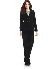 THE LOOKPeaked lapelPadded shouldersDouble breasted button front with exquisite corded buttonsLong sleeves with three-button cuffsDual flap pocketsTHE FITAbout 26 from shoulder to hemTHE MATERIAL70% viscose/30% cuproSilk liningCARE & ORIGINDry cleanMade in Italy THE LOOKPeaked lapelPadded shouldersDouble breasted button front with exquisite corded buttonsLong sleeves with three-button cuffsDual flap pocketsTHE FITAbout 26 from shoulder to hemTHE MATERIAL70% viscose/30% cuproSilk liningCARE & ORIGINDry cleanMade in Italy